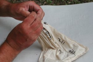 Opening a bird bag 